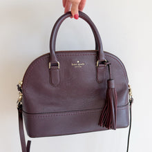 Load image into Gallery viewer, Kate Spade Pebbled Leather McCall Street Carli Doom Satchel with Tassel Plum