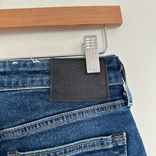 Load image into Gallery viewer, Levi's 721 Rare Capital E High Rise Skinny Jeans Blue 27