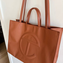 Load image into Gallery viewer, Telfar Large Faux Leather Embossed Logo Snap Closure Crossbody Bag Brown