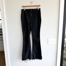 Load image into Gallery viewer, We The Free Raw Hem Denim High Rise Flared Jeans Black 30