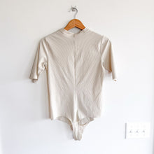 Load image into Gallery viewer, Spanx Suit Yourself Ribbed Stretch Jersey Half Sleeve Bodysuit Cream L
