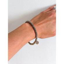 Load image into Gallery viewer, Philippe Audibert Beaded Engraved Logo Charm Stretch Bracelet