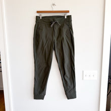 Load image into Gallery viewer, Athleta Headlands Hybrid Trek Mid Rise Jogger Pant Mountain Olive 6