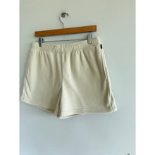 Load image into Gallery viewer, Aritzia Golden Polartec 200 Region Mid Rise Shorts Cream M
