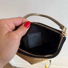 Load image into Gallery viewer, Coach Pebbled Leather Metallic Wristlet Gold OS
