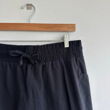 Load image into Gallery viewer, Athleta Excursion Pull On Side Pocket Mini Skort Black S
