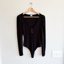 Load image into Gallery viewer, Aritzia Wilfred Puff Sleeve Pearl Button Bodysuit Black M

