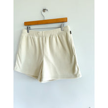 Load image into Gallery viewer, Aritzia Golden Polartec 200 Region Mid Rise Shorts Cream M
