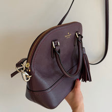 Load image into Gallery viewer, Kate Spade Pebbled Leather McCall Street Carli Doom Satchel with Tassel Plum
