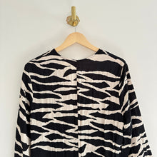 Load image into Gallery viewer, H&amp;M Knot-Detail Zebra Print V-Neck Long Sleeve Midi Dress Black/White S

