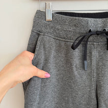 Load image into Gallery viewer, Lululemon Warm Down Jogger II Pant in Heathered Speckled Black 4
