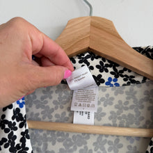 Load image into Gallery viewer, Hanna Andersson Short Sleeve HannaSoft Pajama Top Black Flowers on Ecru L
