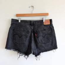 Load image into Gallery viewer, Levi's 501 Original Distressed Hem Button Fly Denim Cut Off Shorts Black 33
