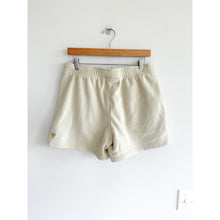 Load image into Gallery viewer, Aritzia Golden Polartec 200 Region Mid Rise Shorts Cream M
