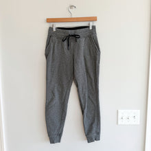 Load image into Gallery viewer, Lululemon Warm Down Jogger II Pant in Heathered Speckled Black 4
