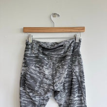 Load image into Gallery viewer, Lululemon Beat The Heat Tight Mesh Leggings 8
