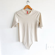 Load image into Gallery viewer, Spanx Suit Yourself Ribbed Stretch Jersey Half Sleeve Bodysuit Cream L

