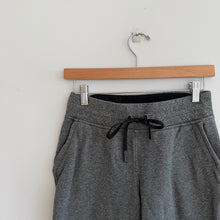 Load image into Gallery viewer, Lululemon Warm Down Jogger II Pant in Heathered Speckled Black 4
