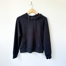 Load image into Gallery viewer, Spanx Air Essentials Pocket Crewneck Hoodie Very Black M NWT
