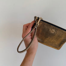 Load image into Gallery viewer, Coach Pebbled Leather Metallic Wristlet Gold OS
