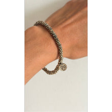 Load image into Gallery viewer, Philippe Audibert Beaded Engraved Logo Charm Stretch Bracelet
