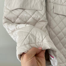 Load image into Gallery viewer, Nikki Jones Montreal Spring 24 Collection Hooded Mid-Length Quilted Vest Cream M
