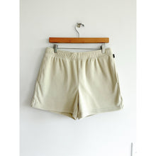 Load image into Gallery viewer, Aritzia Golden Polartec 200 Region Mid Rise Shorts Cream M
