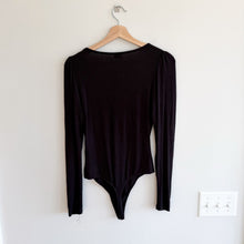 Load image into Gallery viewer, Aritzia Wilfred Puff Sleeve Pearl Button Bodysuit Black M
