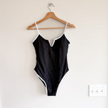 Load image into Gallery viewer, Skota Swim Amor Notch Neckline Adjustable Strap One Piece Swimsuit Black L NWT
