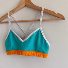 Load image into Gallery viewer, Alo Westerly Colorblock Crisscross Strap Sports Bra Turquoise Orange
