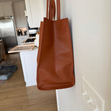 Load image into Gallery viewer, Telfar Large Faux Leather Embossed Logo Snap Closure Crossbody Bag Brown

