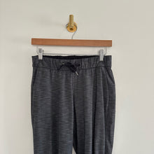 Load image into Gallery viewer, Lululemon On The Fly Drawstring Waist Pants in Heathered Black 4

