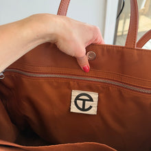 Load image into Gallery viewer, Telfar Large Faux Leather Embossed Logo Snap Closure Crossbody Bag Brown
