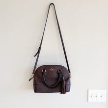 Load image into Gallery viewer, Kate Spade Pebbled Leather McCall Street Carli Doom Satchel with Tassel Plum
